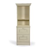 A MODERN CREAM PAINTED BOOKCASE/FILING CABINET with two shelves over two drawers, 78cm wide x 55cm