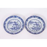 A PAIR OF 18TH CENTURY CHINESE EXPORT BLUE AND WHITE PORCELAIN PLATES each 28.5cm diameter