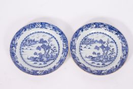 A PAIR OF 18TH CENTURY CHINESE EXPORT BLUE AND WHITE PORCELAIN PLATES each 28.5cm diameter