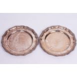 A PAIR OF SILVER PLATED PLATES by Carrington & Co, each with shaped and gadrooned edges, marked M.