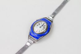 AN ART DECO FRENCH WHITE METAL AND BLUE ENAMEL LADIES WRIST WATCH the enamelled dial with arabic