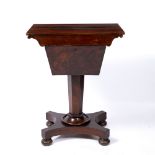 AN EARLY VICTORIAN MAHOGANY WORKTABLE with a hexagonal tapering stem and four turned feet, 60cm wide