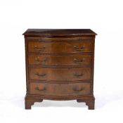 A GEORGIAN STYLE MAHOGANY SERPENTINE CHEST with a brushing slide over four long drawers, and