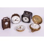 A MINIATURE CARRIAGE TYPE TIMEPIECE OR CLOCK with a Swiss eight day watch type movement and