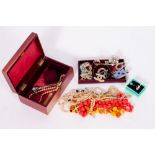 A COLLECTION OF COSTUME JEWELLERY in a leather bound box Condition: overall good condition, possible