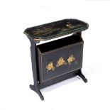 A MID 20TH CENTURY BLACK LACQUERED CHINOISERIE OCCASIONAL TABLE with a swing magazine rack, 46cm