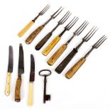 A COLLECTION OF SEVEN ANTIQUE STEEL TWO AND THREE PRONG FORKS with bone and horn handles together