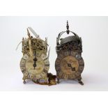 TWO 17TH CENTURY STYLE BRASS LANTERN CLOCKS each signed Thomas Moore, the largest 16cm wide x 36cm
