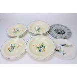 SUSIE COOPER (1902-1995) FOR CROWN BURSLEM a set of eight shallow bowls, printed and impressed