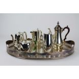 A SILVER PLATED GALLERY OVAL TRAY 60cm wide; a silver plated coffee pot and further silver plated