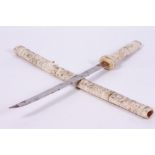 A JAPANESE SWORD with a carved bone grip and scabbard, blade 41cm in length, overall 76cm in