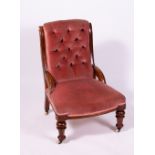 A VICTORIAN WALNUT LOW PINK DRAYLON UPHOLSTERED CHAIR with buttoned back and turned front legs, 62cm