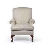 A WESLEY BARRELL STRIPE UPHOLSTERED ARMCHAIR with scrolling arm, carved front legs, approximately