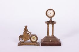 AN EDWARDIAN PARCEL GILT AND CAST BRASS NOVELTY MANTLE TIMEPIECE OR CLOCK in the form of a lady