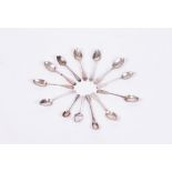 A COLLECTION OF THIRTEEN VARIOUS ANTIQUE SILVER TEASPOONS approximately 250 grams Condition: some