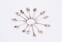 A COLLECTION OF THIRTEEN VARIOUS ANTIQUE SILVER TEASPOONS approximately 250 grams Condition: some