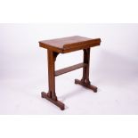 A 19TH CENTURY HARDWOOD ARCHITECTS OR DRAUGHTMANS TABLE with pivoting surface and rising