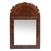 A 17TH CENTURY STYLE YEW WOOD VENEERED CUSHION MOULDED MIRROR 47cm wide x 73cm high Condition: minor