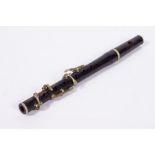 A 19TH CENTURY ROSEWOOD PICCOLO 29cm in length Condition: possible end piece missing