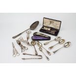 A COLLECTION OF 19TH CENTURY PLATED CUTLERY AND GRAPE SCISSORS to include a large ladle; a