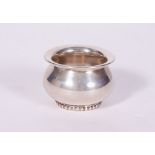 A 835 WHITE METAL BOWL of squat form, with makers mark to the base, 6.4cm wide x 4.5cm high,
