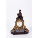 A 19TH CENTURY TIN SPELTER AND GILT METAL MANTLE TIMEPIECE the case surmounted by a Scottish