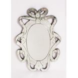 A VENETIAN STYLE WALL MIRROR with bow decoration, having engraved floral motifs, 50cm wide x 75cm