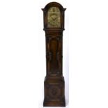 A 1930'S OAK GRANDMOTHER CLOCK the brass dial inscribed 'Tempus Fugit' with roman numerals,