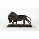 CHRISTOPHE FRATIN (1801-1864) Lion with prey, bronze, signed to the base, 57.5cm long x 16.5cm