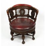 AN OAK FRAMED BURGERMEISTERS CHAIR with circular leather upholstered seat, cabriole legs and