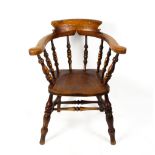 AN ASH AND ELM CAPTAIN'S CHAIR with turned supports, 70cm wide x 50cm deep x 85.5cm high