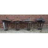 A SET OF FOUR BLACK PAINTED IRON OCTAGONAL LANTERNS of waisted form, 70cm wide x 82cm high