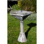 AN ARTS AND CRAFTS STYLE LEAD SUNDIAL with square top and bronze gnomen, on a column support and