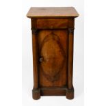 AN EMPIRE MAHOGANY VENEERED MARBLE TOPPED POT CUPBOARD with single frieze drawer, outset turned