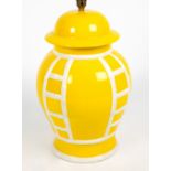 A MID 20TH CENTURY ITALIAN MADE YELLOW GROUND POTTERY TABLE LAMP with bamboo decoration, 31cm wide x