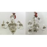 A PAIR OF ANTIQUE CUT GLASS SIX LIGHT ELECTROLIERS with hanging cut glass drops and lusters, each