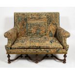 A 19TH CENTURY WILLIAM AND MARY STYLE WALNUT FRAMED SETTEE upholstered in antique Flemish