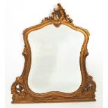 A 20TH CENTURY CARVED GILTWOOD OVERMANTLE MIRROR with bevelled glass, 110cm wide x 118.5cm high