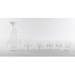 A SUITE OF DAUM GLASSWARE consisting of a decanter, nine large wine glasses, twelve medium