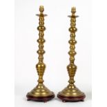 A PAIR OF BRASS LAMPS of bobbin turned form, each 58cm in height Condition: untested, need rewiring,