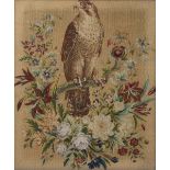 A VICTORIAN NEEDLEWORK PICTURE depicting a falcon resting on a flowering branch and set within a