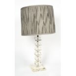A CONTEMPORARY GLASS AND CHROME SQUARE SECTION TABLE LAMP the base 14cm wide, the lamp 43.5cm high