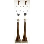 A PAIR OF CONTEMPORARY STAINED RESIN AND CHROME TABLE LAMPS of fluted tapering form, each 95cm