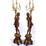 A PAIR OF BLACKAMORE TORCHERES each with six gilt acanthus leaf decorated scrolling branches, the