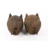 A PAIR OF BENIN BRONZE STYLE CHEETAH HEAD MASKS each 17cm wide x 25cm high (2) Condition: in good