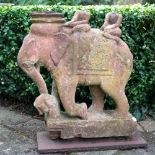 AN ANTIQUE INDIAN CARVED SANDSTONE SCULPTURE of two riders on an elephant, 44cm long x 55cm high