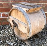 AN ANTIQUE SYCAMORE OR PINE COOPERED BUTTER CHURN with galvanized turning handle, 38cm wide x 41cm