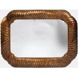 A LATE 20TH CENTURY SHAPED AND GILDED WALL MIRROR 116cm wide x 90cm high At present, there is no