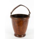 A 19TH CENTURY LEATHER FIRE BUCKET with copper wire stitching and impressed mark 'Tilley', 26cm