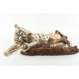 A MEXICAN D'ARGENTI WHITE METAL COVERED MODEL OF A LEOPARD Jolly, signed and numbered 212/500,
